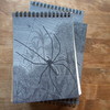 Blank (coil-bound) spider print notebooks from Eberhardt Press